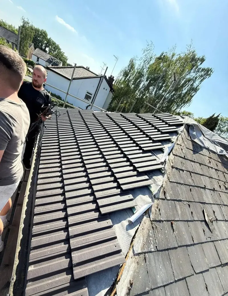 Completed garage roof covering with new trims and edging