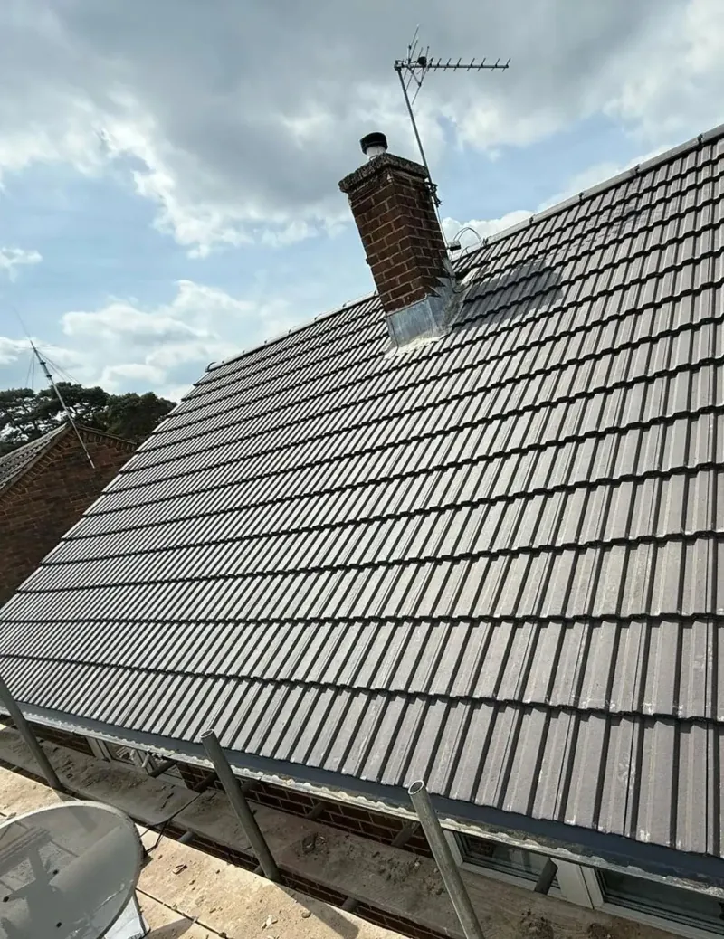 Pitched slate roof being re-laid on a period property in Ascot